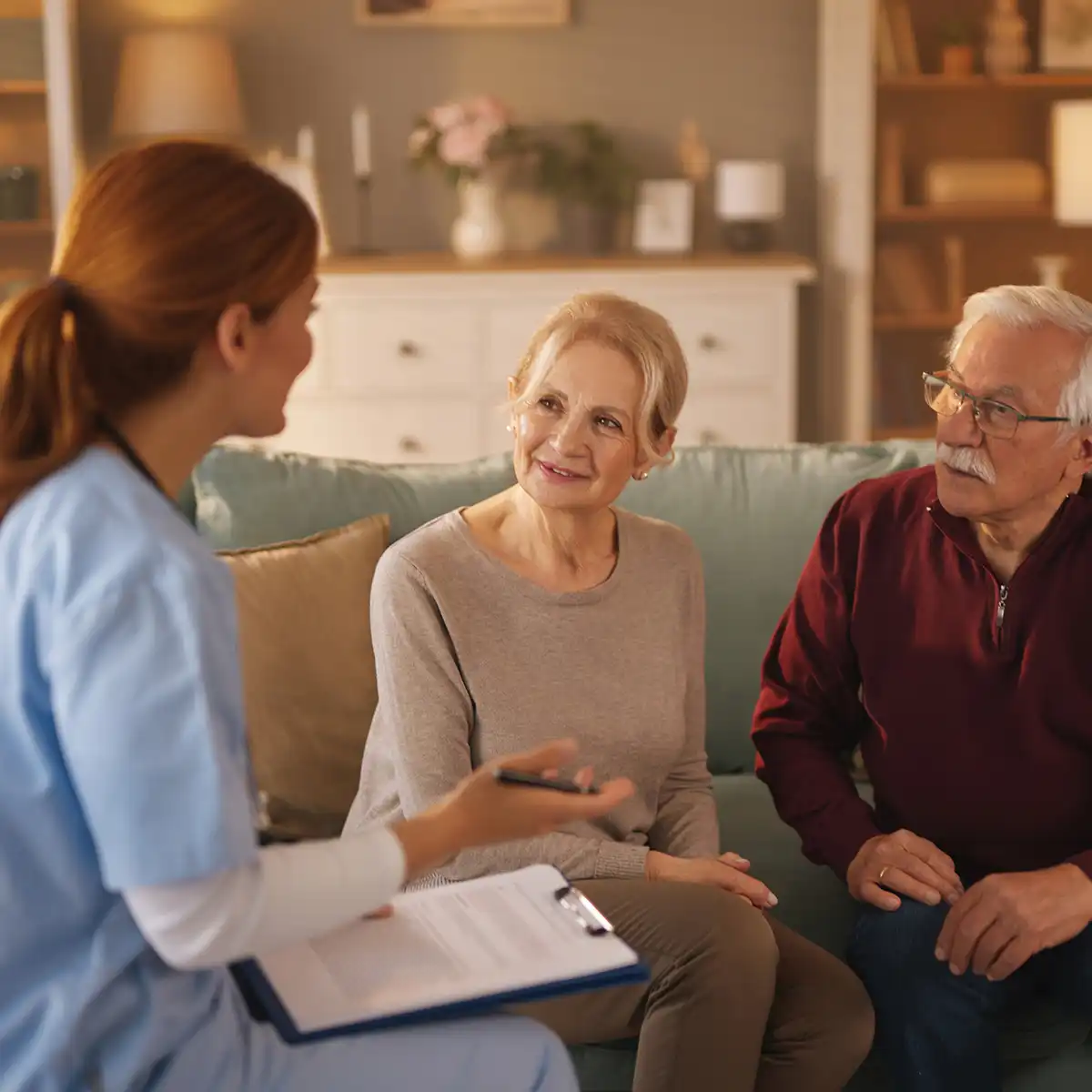 Compassionate caregiver supporting an older adult resident