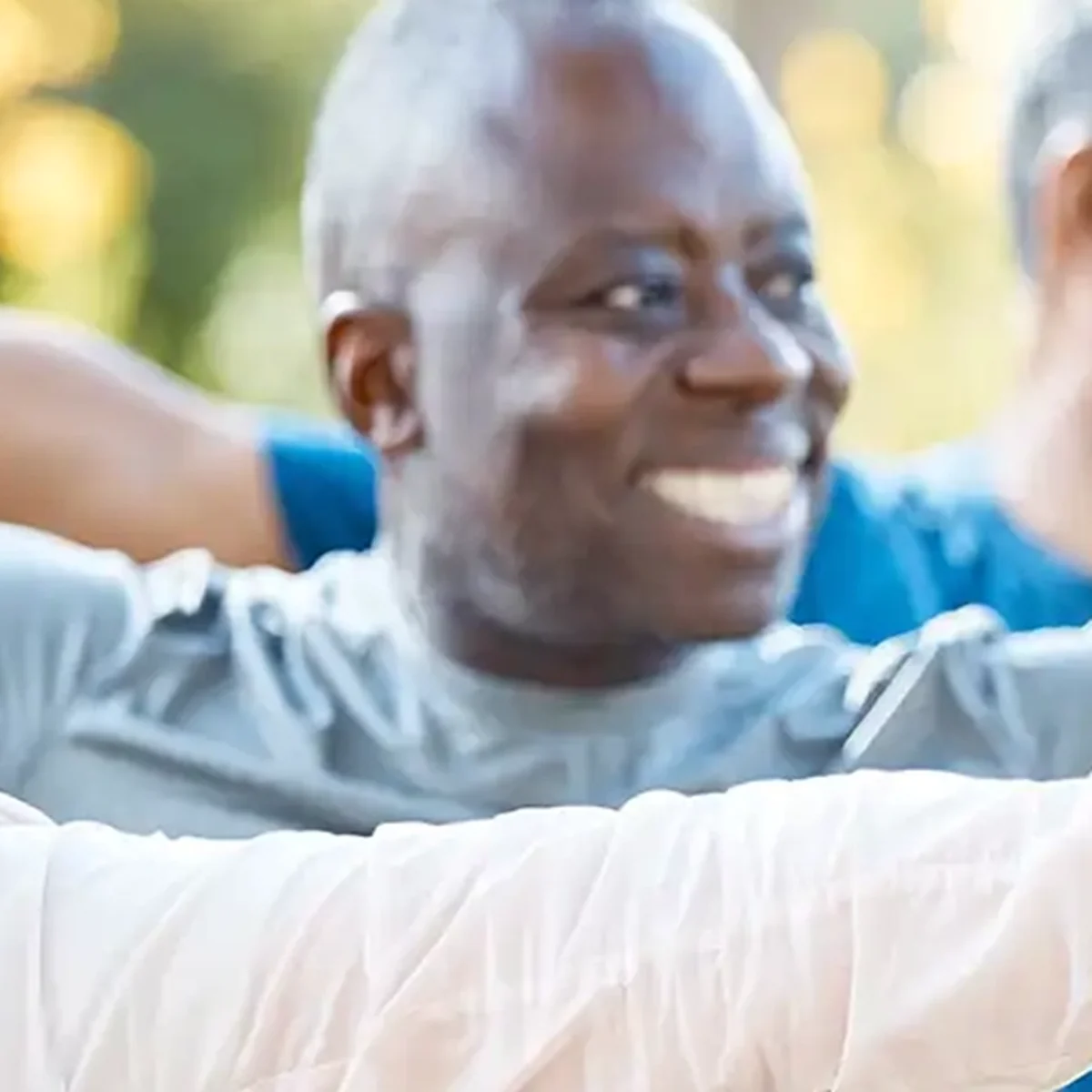 Caregiver providing attentive support to an older adult resident